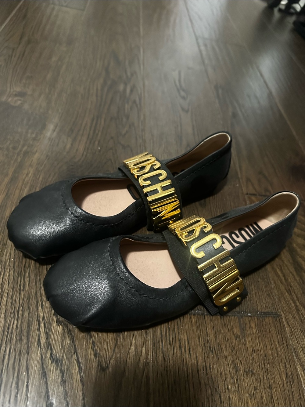 Moschino  Black Ballet Flats with Gold Logo Strap Accent